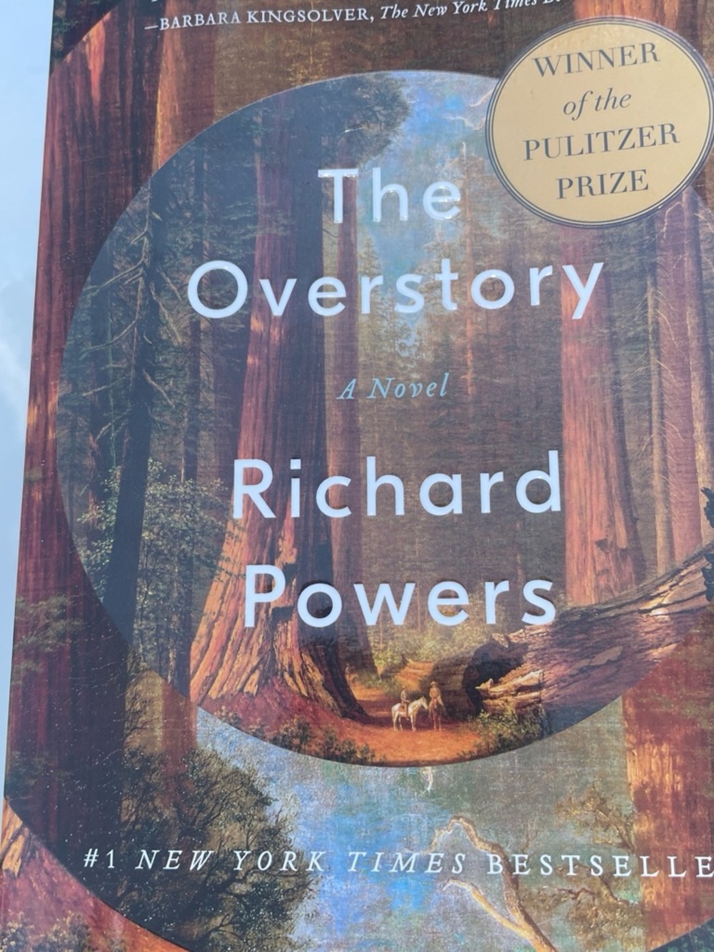 The Overstory by Richard Powers — Hardcover with Red and Brown Forest Cover